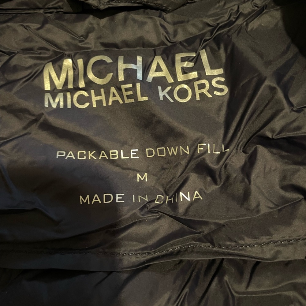 Micheal Kors packable navy jacket.